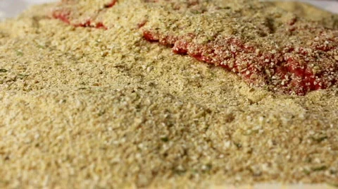 Close up shot of veal being breaded. Stock Footage 847762