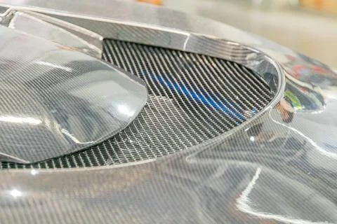 A close-up shot of a vehicles front corner, focusing on aerodynamic component Stock Photos