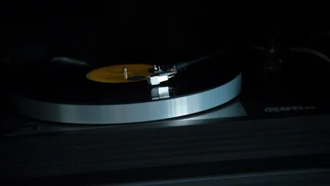 Close up shot of vinyl record playing Stock Footage 98740529