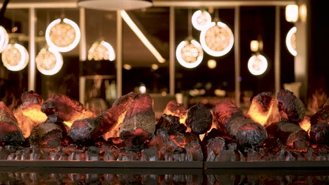 Close-up shot of warm cozy burning fire in a electric fireplace. 4K Video stock 86546908