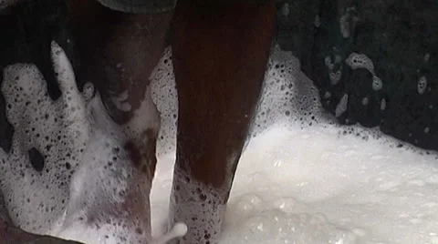 Close shot of washing dyed threads of handloom Stock-Footage 39616705