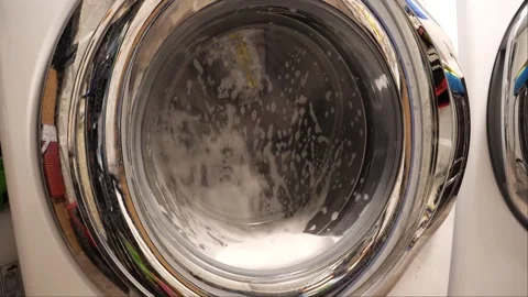 Close up shot of a washing machine in the laundry with detergent 스톡 동영상 267805157