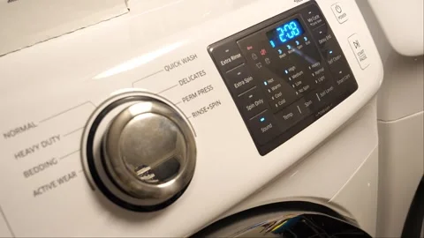 Close up shot of a washing machine in the laundry with detergent 스톡 동영상 267805227