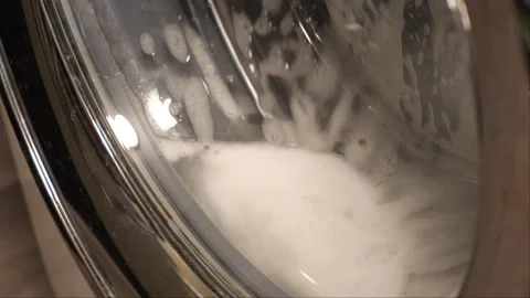 Close up shot of a washing machine in the laundry with detergent 스톡 동영상 267805291
