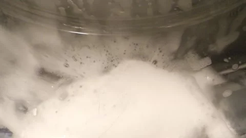 Close up shot of a washing machine in the laundry with detergent 스톡 동영상 267805309