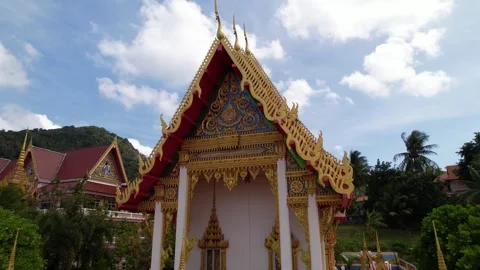 Close-up shot of Wat Karon temple, golden decorations, dragons culture, Buddhism Stock Footage 245559932