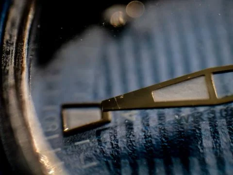 Close up shot of watch with a solar panel, macro shot, arow on a used clock Stock Photos
