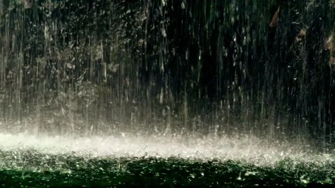 Close-up shot of waterfall falling on rocky cliff Stock Footage 259852446