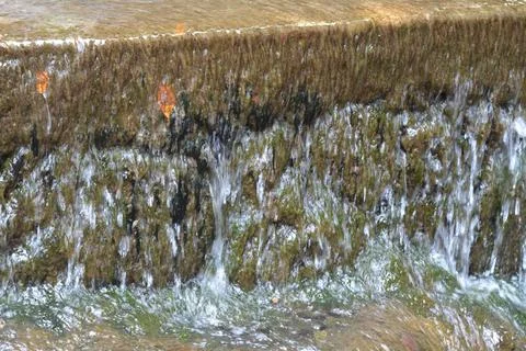 Close up shot of waterfall on park Stock Photos
