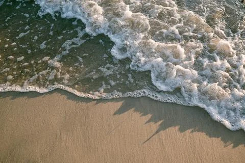 Close up shot of waves at the beach Photos