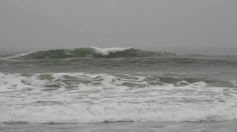 Close up shot of waves breaking on a calm day. Video stock 12113150