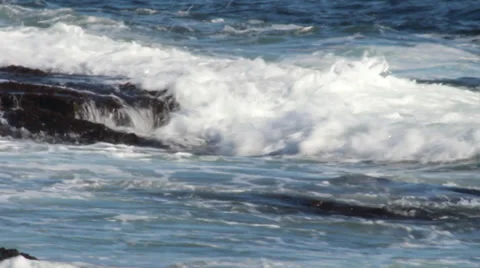Close-up Shot of Waves Crashing on Rocks Stock Footage 33258775