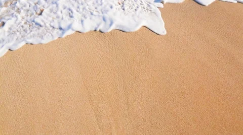 Close Up Shot of Waves Rolling Up White Sand Beach. Stock Footage 53893038