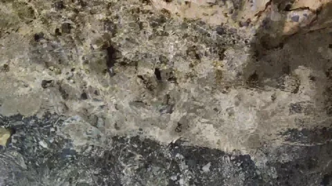 Close Up Shot of Waves Rolling Up White Sand Beach.  Stock Footage 197142075