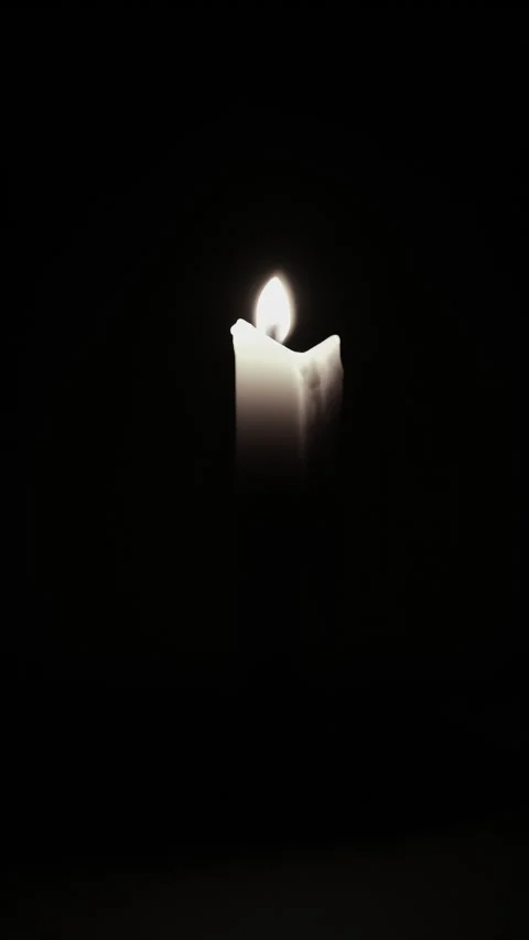 Close up shot of wax candle burning timelapse with flame glowing on wick in.. Stock Footage 344625588