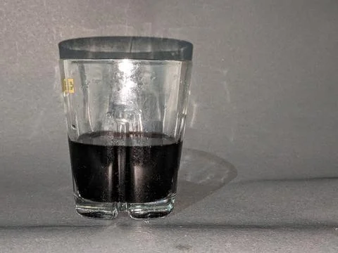 Close up of a shot of whiskey on a bar table top Stock Photos