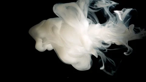 Close-up shot. white color flow in water and move Use for inky background or Stockbeeldmateriaal 99444348