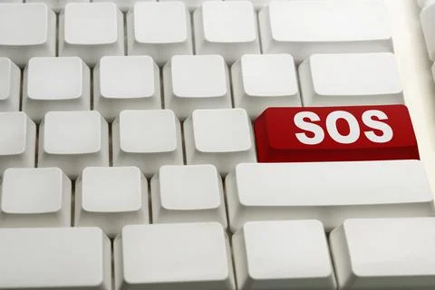 A close-up shot of a white computer keyboard with a single red button label.. 스톡 사진
