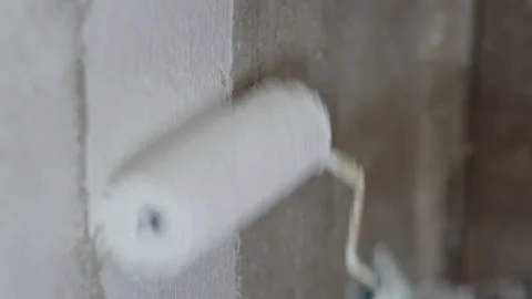 Close Up Shot of White Paint being applied on a wall. Room Renovations at Home Stock Footage 143233624