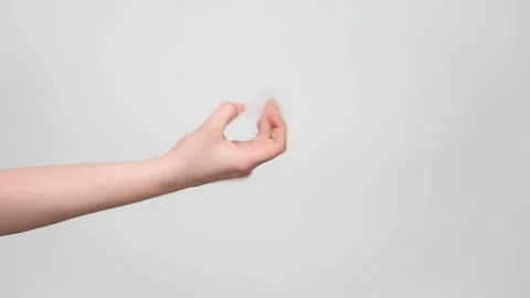 Close up shot of a woman's hand making a flick gesture. 4k, slow motion. Stock Footage 238612131