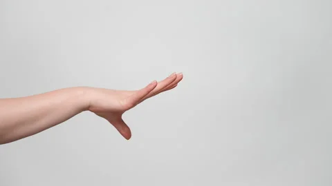 Close up shot of a woman's hand making a flick gesture. 4k, slow motion. Stock Footage 238612321