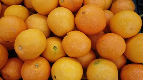 Close-up Shot of the Woman's Hand Taking Orange from the Supermarket Video stock 122329342