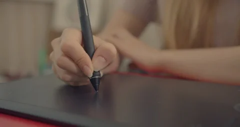 Close up shot . Womans hand using graphic pen and tab , working time for some gr Stock Footage 117476804
