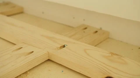 Close-up shot of a wooden framework that was screwed in with a pocket hole j Stock Footage 149132590
