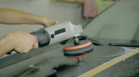 Close up shot Worker polish black car with special tools Stock Footage 65760202