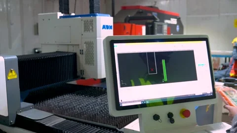 Close Up Shot Of A Worker Programming And Operating A CNC Machine In A 스톡 동영상 328135518