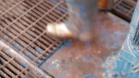 Close Up of Shot a worker walking over a grille at an oil and gas facility Video stock 45236493