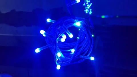 Close-up shot of wrapped up green LED string Stock-Footage 247734678