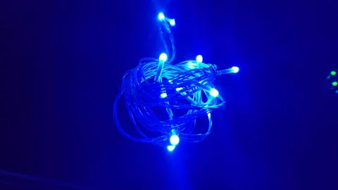 Close-up shot of wrapped up green LED string Stock-Footage 247734687