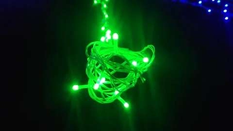 Close-up shot of wrapped up green LED string. Stock Footage 247734689