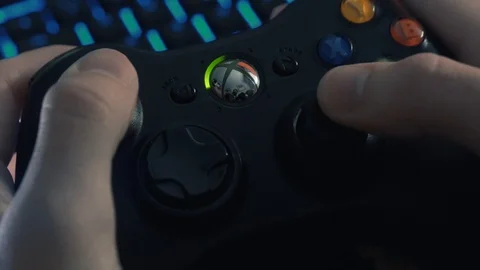 Close shot of an xbox controller pad while gaming. Stock Footage 128346545
