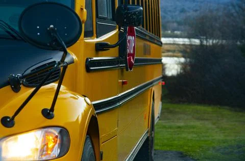 Close-up shot of a yellow schoolbus during the day Stock Photos