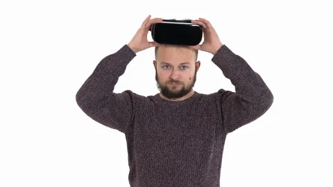 Close-up shot of a young bearded hipster man wearing virtual reality glasses - Stock Footage 121191663