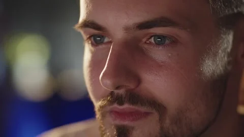 Close up shot young bearded man looking at computer monitor. Stressed Stock Footage 274489332