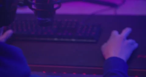 Close up shot, young boy is playing games on computer in his room Stock Footage 141923493