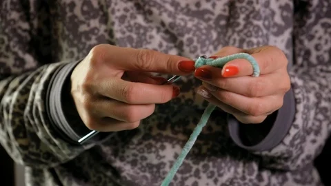 Close up shot: Young Girl Hands Knitting at home. Slow motion. 4k Stock-Footage 103431953