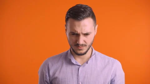Close shot of young man with with a toothache touching his cheek Stock Footage 138519987