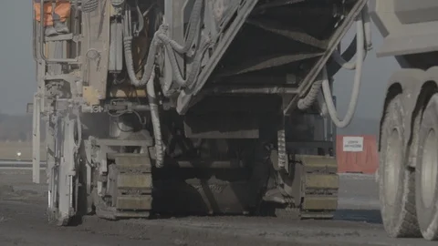 Close up shots of construction site during the rebuild of airfield runway Stock Footage 94827344