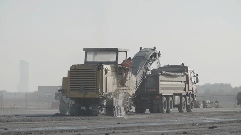 Close up shots of construction site during the rebuild of airfield runway Stock Footage 94827875