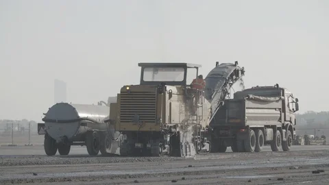Close up shots of construction site during the rebuild of airfield runway Stock Footage 94827933