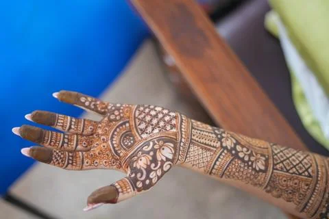 Close-up shots of an Indian bride getting henna/Mehendi or mehndi done Stock Photos