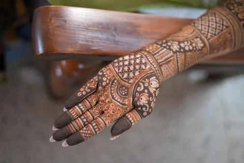 Close-up shots of an Indian bride getting henna/Mehendi or mehndi done Stock Photos