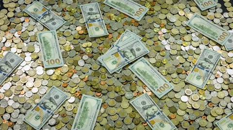 Close-up shots one hundred dollars banknote and coins currency. Stock Footage 61780441