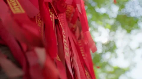 Close-Up Shots of Prayer Ribbons Drifting in the Wind at Eastern Chinese Temples Stock Footage 303419339