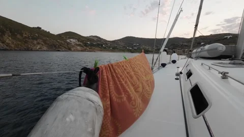 Close-up shots of ropes, pulleys and mast of a sailboat, a towel spread out Stock Footage 268041442