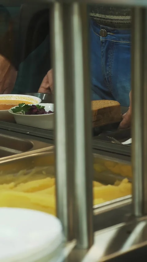 Close-up, showcase with dishes in modern Self service canteen, cafeteria, mess Stock Footage 322978770